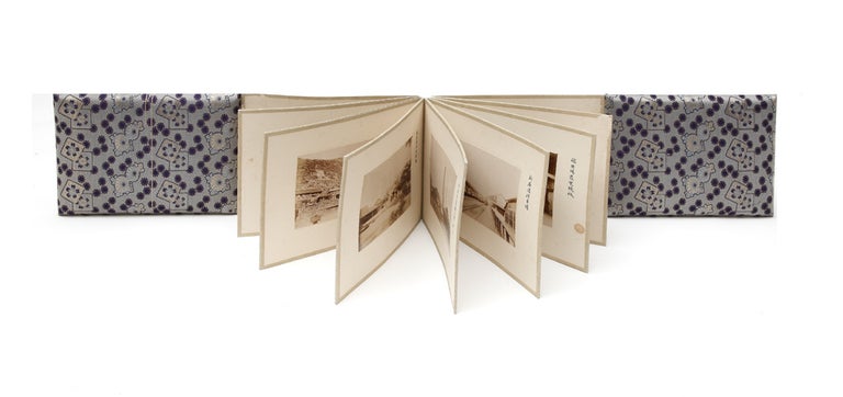 Item ID: 6296 A concertina album of 32 original albumen photographs (each 100 x 140 mm.) of the famous Besshi Copper mining works, each mounted on thick board. Toshimo MITSUMURA, photographer.
