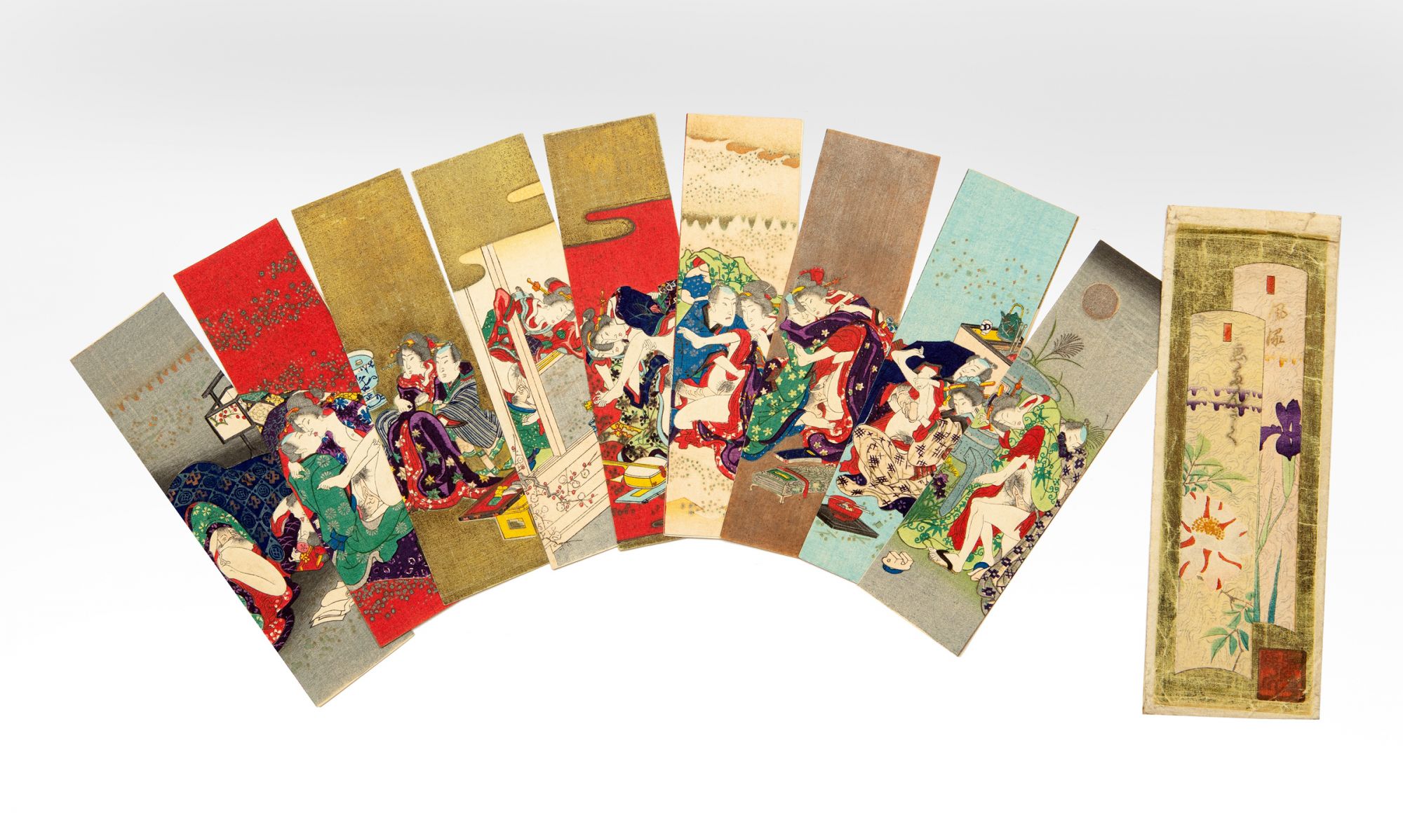 Ten tanzaku tall narrow cards for printing poetry , each consisting of two  panels of thick paper joined at head, the upper card with an erotic color- printed woodcut, the lower with printed